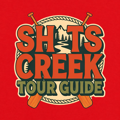 Shits Creek Tour Guide graphic T-shirt featuring bold retro lettering with crossed paddles, rope, mountains, pine trees and a winding creek - red
