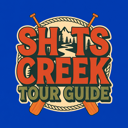 Shits Creek Tour Guide graphic T-shirt featuring bold retro lettering with crossed paddles, rope, mountains, pine trees and a winding creek - royal blue